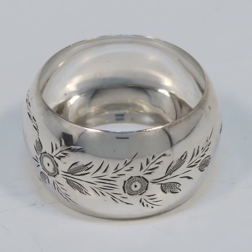 A set of six Antique Sterling Silver napkin rings, having round bellied bodies with hand-engraved floral decoration surrounding vacant cartouches, all in their original light blue satin-lined presentation box. This beautiful set of silver napkin rings were made by Joseph Gloster of Birmingham 1913. The dimensions of these fine hand-made antique silver napkin rings are diameter 5 cms (2 inches), height 2.5 cms (1 inch), and they weigh a total of approx. 107g (3.5 troy ounces).