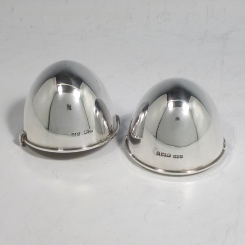 Sterling silver very unusual egg holder / box, having a very plain oval egg-shaped body, that has a twist-action bayonet-fitting. Made by James Dixon & Sons of Sheffield in 1924. The dimensions of this fine-hand-made silver egg box / holder are length 8 cms (3 inches), diameter 5 cms (2 inches), and it weighs approx. 58g (1.9 troy ounces). 