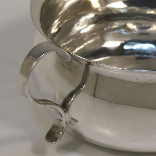 A very unusual Antique Victorian Sterling Silver copy of a bedchamber pot, having a plain bellied body, and a scroll side-handle. This handsome antique silver bedchamber pot bowl was made by Lamberts of London in 1890. The dimensions of this fine hand-made antique silver chamber pot are diameter 11 cms (4.25 inches), height 6 cms (2.3 inches), and it weighs approx. 140g (4.5 troy ounces).
