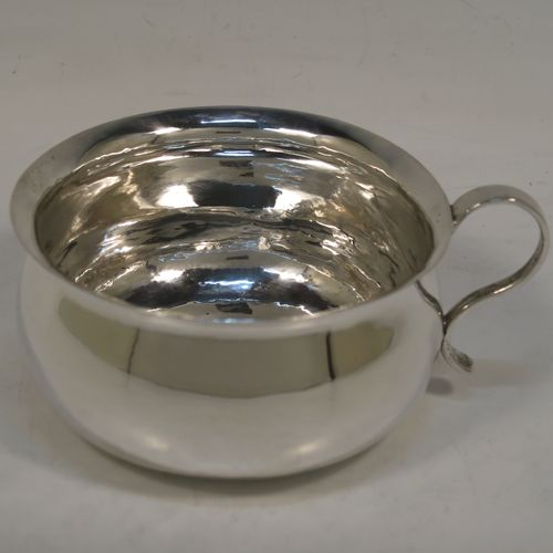 A very unusual Antique Victorian Sterling Silver copy of a bedchamber pot, having a plain bellied body, and a scroll side-handle. This handsome antique silver bedchamber pot bowl was made by Lamberts of London in 1890. The dimensions of this fine hand-made antique silver chamber pot are diameter 11 cms (4.25 inches), height 6 cms (2.3 inches), and it weighs approx. 140g (4.5 troy ounces).