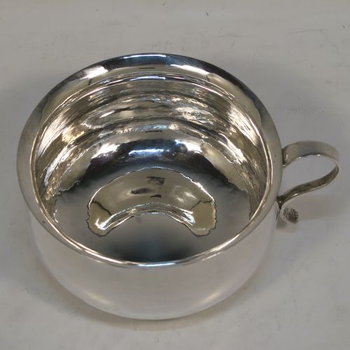 A very unusual Antique Victorian Sterling Silver copy of a bedchamber pot, having a plain bellied body, and a scroll side-handle. This handsome antique silver bedchamber pot bowl was made by Lamberts of London in 1890. The dimensions of this fine hand-made antique silver chamber pot are diameter 11 cms (4.25 inches), height 6 cms (2.3 inches), and it weighs approx. 140g (4.5 troy ounces).