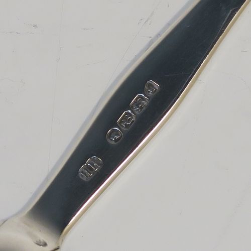 A rare Antique Victorian Sterling Silver double bowled medicine spoon, having a very plain body with oval bowls. This elegant antique silver double-bowled medicine spoon was made by Henry Holland of London in 1870. The dimensions of this fine hand-made antique silver medicine spoon are length 13.5cms (5.3 inches), and it weighs approx. 29g (0.9 troy ounces).