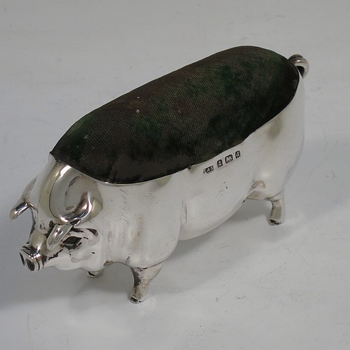 A handsome and unusually large Antique Edwardian Sterling Silver pin cushion, in the form of a pig with a dark green velvet covered pin cushion along its back. Made by Levi and Salaman of Birmingham in 1903. The dimensions of this fine hand-made antique silver Pig pin cushion are length 6 cms (2.3 inches), width 3 cms (1.25 inches), an height 5.5 cms (2.25 inches). Please note that the green velvet is discoloured.