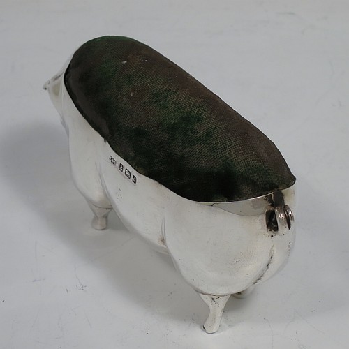 A handsome and unusually large Antique Edwardian Sterling Silver pin cushion, in the form of a pig with a dark green velvet covered pin cushion along its back. Made by Levi and Salaman of Birmingham in 1903. The dimensions of this fine hand-made antique silver Pig pin cushion are length 6 cms (2.3 inches), width 3 cms (1.25 inches), an height 5.5 cms (2.25 inches). Please note that the green velvet is discoloured.