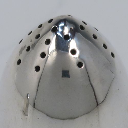 A very rare and handsome pair of Antique Sterling Silver Bullet case or cartridge pepper pots, having plain round bodies with pull-off Primer style flat bases. This elegant pair of silver Bullet style pepper pots were made on the eve of the First World War by Henry Wilkinson of Sheffield in 1914. The dimensions of this rare pair of Cartridge or Bullet pepper shakers are height 6 cms (2.25 inches), diameter at base 3.5 cms (1.3 inches), and they weigh a total of approx. 66g (2 troy ounce).