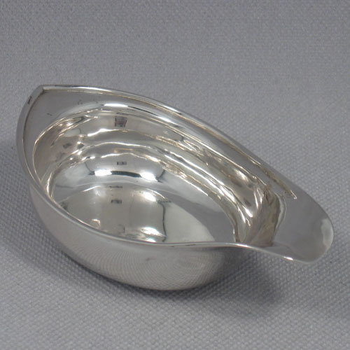Antique Georgian sterling silver pap boat made in London in 1815. Length 12.5 cms, width 7 cms.