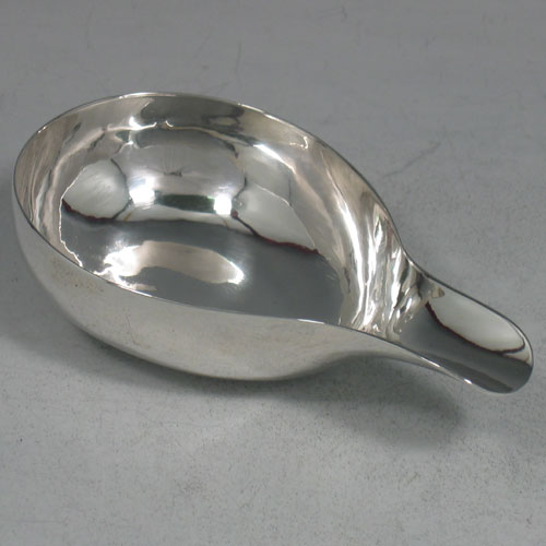 Antique Georgian, sterling silver pap boat, made in London, 1729 (with a set of contemporaneous initials). Length 12 cms.