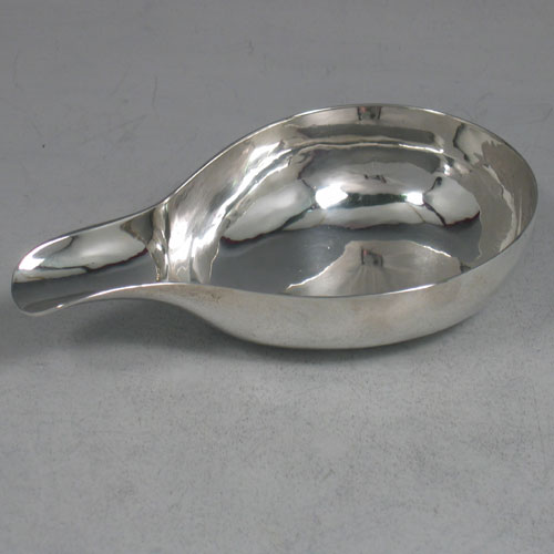 Antique Georgian, sterling silver pap boat, made in London, 1729 (with a set of contemporaneous initials). Length 12 cms.