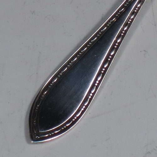 A Sterling Set of six pastry forks, having single-struck bead and pearl handles, and three tined forks, all in their original satin and velvet-lined presentation box. Made by Suckling Ltd., of Birmingham in 1925. The dimensions of these fine hand-made silver pastry forks are length 12.5 cms (5 inches), and they weigh a total of 99g (3.2 troy ounces). Please note that the interior satin lining is damaged and the exterior of the box has worn corners.