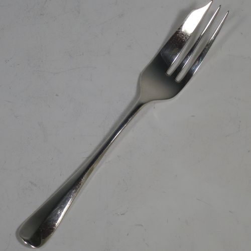 A handsome Sterling Silver set of six pastry forks and a serving fork in the Hanoverian pattern, all in their original cream satin and black velvet-lined presentation box. Made by Charles Boyton and Sons of Sheffield in 1931. The dimensions of these fine hand-made silver pastry forks are length 13.5 cms (5.25 inches), and they weigh a total of 122g (3.9 troy ounces).