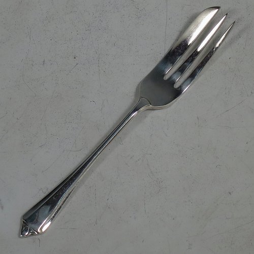 A Sterling Silver set of six pastry forks in the Belmont pattern, with three tined forks, all in their original cream satin and blue velvet-lined presentation box. Made by George William & Percy Shirtcliffe of Sheffield in 1946. The dimensions of these fine hand-made silver pastry forks are length 12.5 cms (5 inches), and they weigh a total of 97g (3 troy ounces).