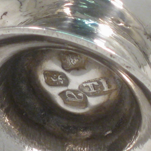 Antique Georgian sterling silver pepper pot, having a plain baluster body, a hand-pierced pull-off lid with finial, and sitting on a pedestal foot. Made by Thomas Bamford I of London in 1736. The dimensions of this fine hand-made silver pepper pot are height 13.5 cms (5.3 inches), diameter of main body 4.5 cms (1.75 inches), and it weighs approx. 101g (3.3 troy ounces).