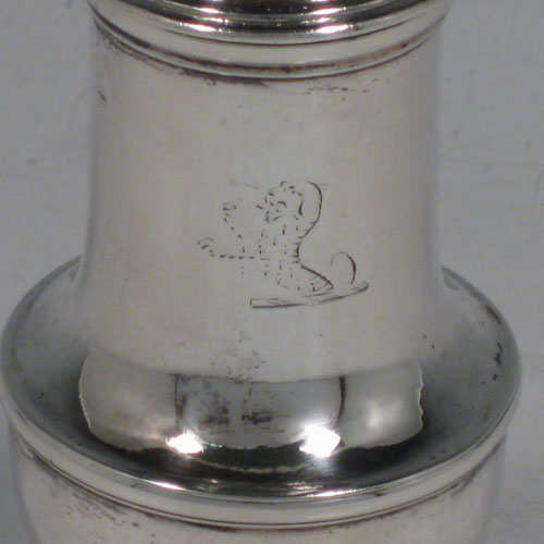Antique Georgian sterling silver pepper pot, having a plain baluster body, a hand-pierced pull-off lid with finial, and sitting on a pedestal foot. Made by Thomas Bamford I of London in 1736. The dimensions of this fine hand-made silver pepper pot are height 13.5 cms (5.3 inches), diameter of main body 4.5 cms (1.75 inches), and it weighs approx. 101g (3.3 troy ounces).