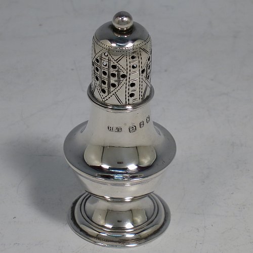 An Antique Victorian Sterling Silver pair of pepper pots, having plain round bellied bodies, with reeded borders, pull-off hand-pierced lids with ball finials, and sitting on pedestal feet. Made by Hilliard & Thomason of Birmingham in 1899. The dimensions of these fine hand-made antique silver pepper pots are height 7 cms (2.75 inches), diameter 3 cms (1.25 inches), and they weigh a total of approx. 43g (1.4 troy ounces). Please note that these items are crested.