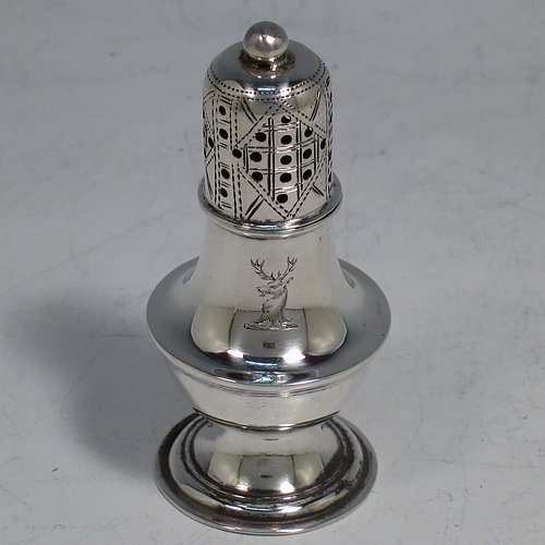 An Antique Victorian Sterling Silver pair of pepper pots, having plain round bellied bodies, with reeded borders, pull-off hand-pierced lids with ball finials, and sitting on pedestal feet. Made by Hilliard & Thomason of Birmingham in 1899. The dimensions of these fine hand-made antique silver pepper pots are height 7 cms (2.75 inches), diameter 3 cms (1.25 inches), and they weigh a total of approx. 43g (1.4 troy ounces). Please note that these items are crested.