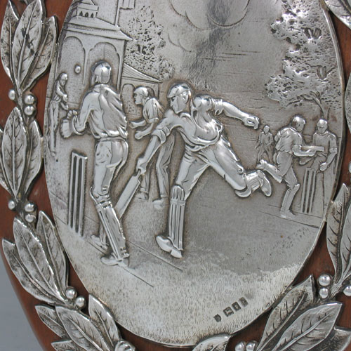 Sterling silver Cricket trophy plaque made in London, 1920. Height 23 cms, width 18.5 cms.