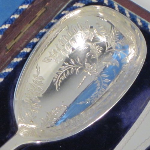 Antique Victorian silver-plated pair of salad servers, having oval bowls and geometrically shaped handled, and featuring hand-engraved floral decoration, all in their original blue satin and velvet-lined presentation box. Made by Francis Higgins in ca. 1880. The length of these fine hand-made silver salad servers are 24 cms (9.5 inches).   
