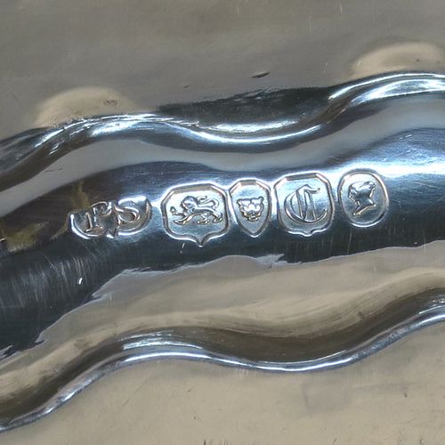 A beautiful Antique early Victorian Sterling Silver salver, having an applied cast shell and scroll border, the ground having hand-chased floral and scroll decoration surrounding a central vacant cartouche, and all sitting on three cast and pierced scroll feet. This fantastic salver was made by the most important 19th century British silversmith Paul Storr of London in 1838. The dimensions of this fine hand-made antique silver salver are diameter 32 cms (12.3 inches), height 4 cms (1.5 inches), and it weighs approx. 1,006g (32.5 troy ounces).