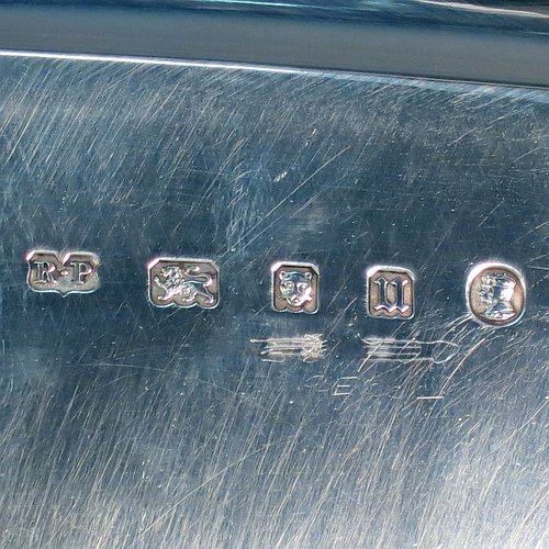 A Sterling Silver salver, having a square cut-corner body, with a plain burnished ground, an applied cut-corner border, and sitting on four cast hoof feet. Made by Robert Pringle of London in 1935. The dimensions of this fine hand-made silver salver are 34 cms (13.5 inches) square, and it weighs approx. 1,116g (36 troy ounces).