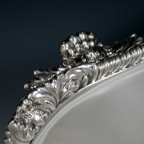 Antique Georgian sterling silver rectangular salver with gadroon & shell border made in London in 1825. Length 42 cms, width 31 cms.