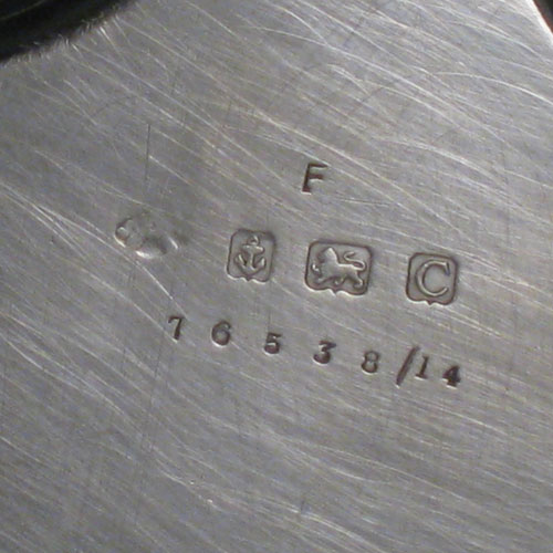 Sterling silver large salver, having a Chippendale border, plain ground, and sitting on three cast scroll feet. Made by the Adie Brothers of Birmingham in 1927. Diameter 36 cms (14 inches). Weight approx. 1,270g (41 troy ounces).