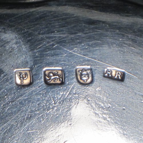 Antique Georgian sterling silver salver, having a shaped gadroon border, a plain ground with a centrally engraved armorial crest, and sitting on three cast hoof feet. Made by Richard Rugg of London in 1770. The dimensions of this fine hand-made silver salver are diameter 30 cms (12 inches), and it weighs approx. 784g (25 troy ounces).