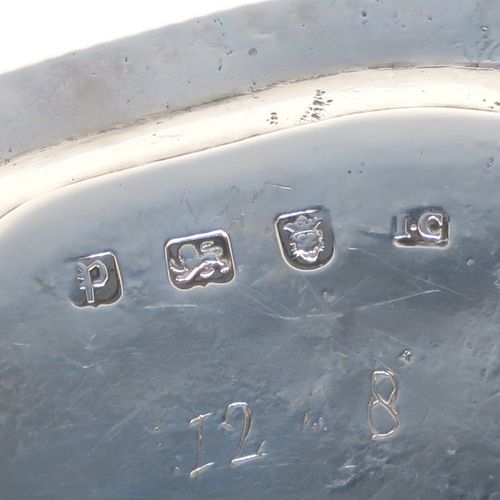 A very handsome Antique Georgian Sterling Silver salver, having an applied shaped gadroon border, a plain ground with a hand-engraved full armorial crest with a Latin inscription for Faith Is All, and sitting on three cast claw and ball feet. This elegant antique silver salver was made by John Crouch of London in 1770. The dimensions of this fine hand-made silver salver are diameter 20 cms (8 inches), and it weighs approx. 343g (11 troy ounces).