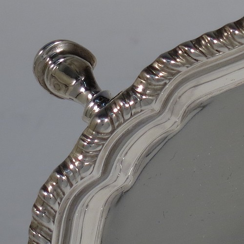 A very handsome Sterling Silver salver, having an applied shaped gadroon border, a plain ground, and sitting on four cast hoof feet. Made by William Bush of Sheffield in 1942. The dimensions of this fine hand-made silver salver are diameter 20 cms (8 inches), and it weighs approx. 375g (12 troy ounces).