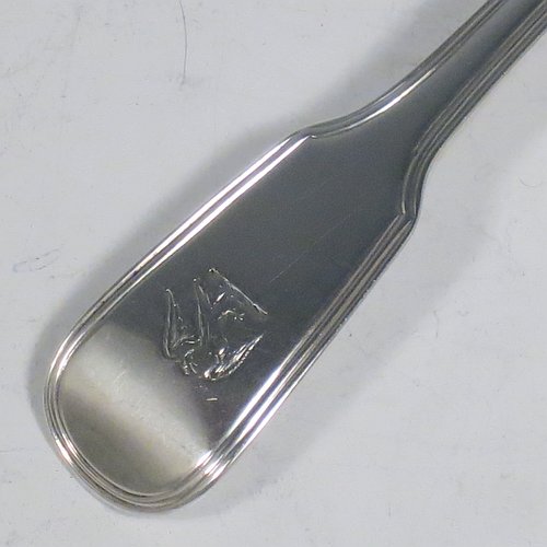 An Antique Georgian Sterling Silver pair of Sauce Ladles in the double-struck Fiddle & Thread pattern. Made by George Piercy of London in 1821. The dimensions of this fine pair of hand-made antique silver sauce ladles are length 17 cms (6.75 inches), and they weigh a total of approx. 140g (4.5 troy ounces). Please note that these items are crested.