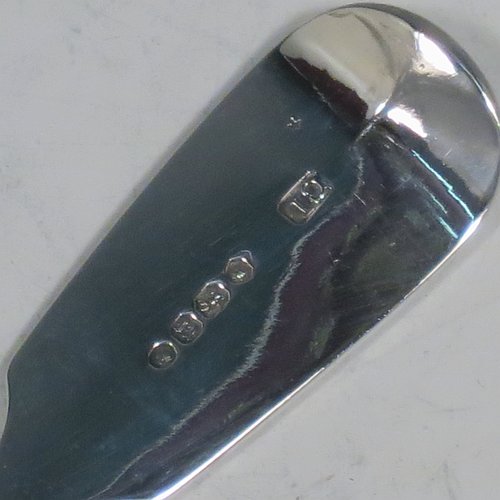 An Antique Victorian Sterling Silver pair of Sauce Ladles in the plain Fiddle pattern with pip on reverse. Made by Charles Lias of London in 1847. The dimensions of this fine pair of hand-made antique silver sauce ladles are length 18.5 cms (7.25 inches), and they weigh a total of approx. 140g (4.5 troy ounces).