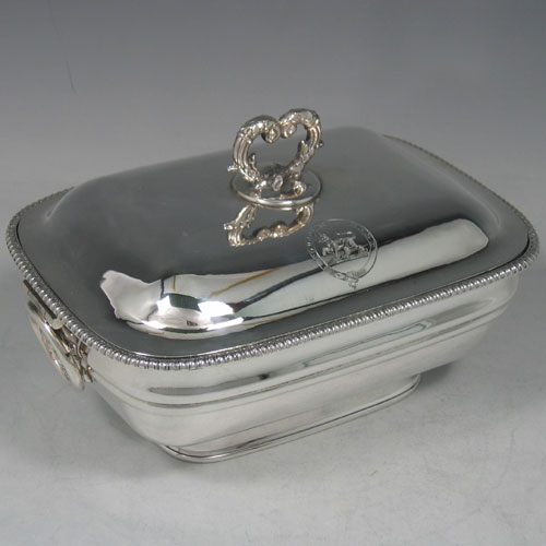 Antique Georgian Old Sheffield plated pair of early Regency style sauce tureens made in circa 1810. Length 19 cms, height 11 cms.