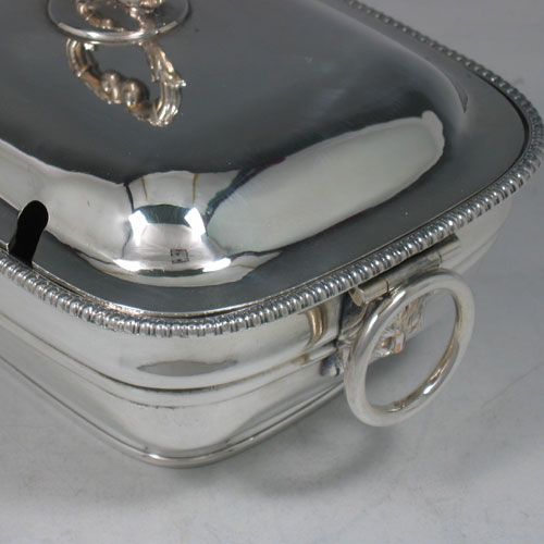 Antique Georgian Old Sheffield plated pair of early Regency style sauce tureens made in circa 1810. Length 19 cms, height 11 cms.