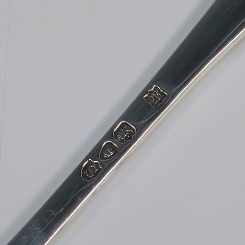 A very pretty pair of Antique Victorian Sterling Silver berry serving spoons, having hand-chased handles with floral decoration, and hand-chased bowls with fluted and fruit decoration, all in their original light blue satin and dark blue velvet-lined presentation box. These beautiful silver serving spoons were made by William Hutton and Sons of London in 1893. The dimensions of this fine hand-made pair of antique silver berry spoons are length 22cms (8.75 inches), and they weigh a total of approx. 146g (4.7 troy ounces).   