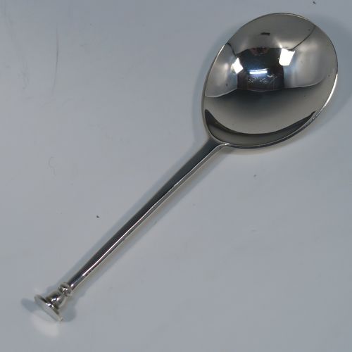 A very handsome pair of Antique Victorian Sterling Silver serving spoons in an old seal-top style, having cast handles and plain round bowls, all in their original dark blue satin and velvet-lined velvet-lined presentation box. These beautiful silver seal-top serving spoons were made by John Edward Wilmot of Birmingham in 1897. The dimensions of this fine hand-made pair of antique silver serving spoons are length 15 cms (6 inches), and they weigh a total of approx. 78g (2.5 troy ounces).