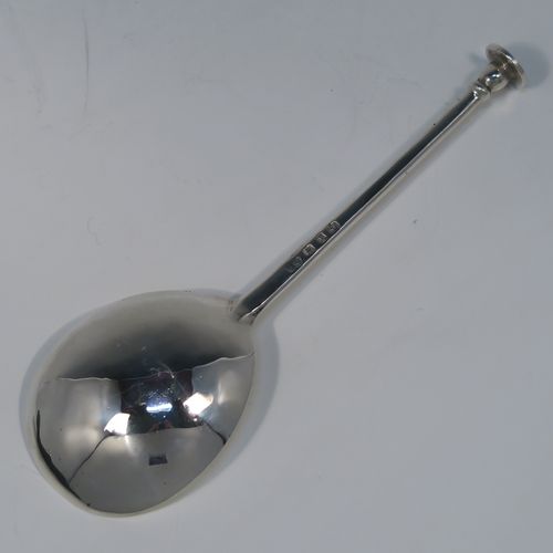 A very handsome pair of Antique Victorian Sterling Silver serving spoons in an old seal-top style, having cast handles and plain round bowls, all in their original dark blue satin and velvet-lined velvet-lined presentation box. These beautiful silver seal-top serving spoons were made by John Edward Wilmot of Birmingham in 1897. The dimensions of this fine hand-made pair of antique silver serving spoons are length 15 cms (6 inches), and they weigh a total of approx. 78g (2.5 troy ounces).