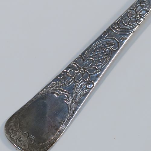 A very pretty pair of Antique Georgian Sterling Silver and gold-gilt berry serving spoons, having hand-chased handles with floral and scroll decoration, and gold-gilt hand-chased fluted bowls with fruit decoration, all in their original maroon satin and velvet-lined presentation box. These beautiful antique silver berry serving spoons were made by John Lampfelt of London in ca. 1770. The dimensions of this fine hand-made pair of antique silver berry spoons are length 22cms (8.75 inches), and they weigh a total of approx. 115g (3.7 troy ounces).   