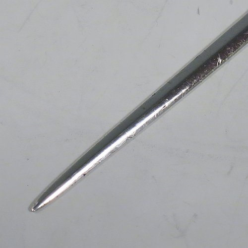 An Antique Georgian Sterling Silver meat or game bird skewer, having a very plain tapering body with ring handle. Made by William Sumner I of London in 1793. The dimensions of this fine hand-made antique silver game bird or meat skewer are length 27 cms (10.5 inches), and it weighs approx. 108g (3.5 troy ounces).