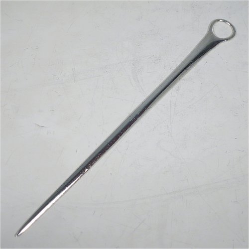 An Antique Georgian Sterling Silver meat or game bird skewer, having a very plain tapering body with ring handle. Made by William Sumner I of London in 1793. The dimensions of this fine hand-made antique silver game bird or meat skewer are length 27 cms (10.5 inches), and it weighs approx. 108g (3.5 troy ounces).