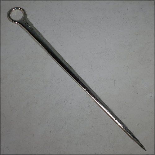 An Antique Georgian Sterling Silver meat or game bird skewer, having a very plain tapering body with ring handle. Made by Richard Crossley of London in 1794. The dimensions of this fine hand-made antique silver game bird or meat skewer are length 29 cms (11.5 inches), and it weighs approx. 98g (3 troy ounces). Please note that this item is in original condition with a crest and it still has the old scratch marks from using a carving knife.