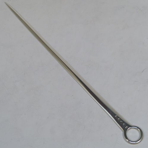 A large and very handsome Antique Georgian George II Sterling Silver meat or game bird skewer, having a very plain tapering body with a plain ring handle. This elegant antique silver skewer was made by Stephen Adams II of London in 1805. The dimensions of this fine hand-made antique silver game bird or meat skewer are length 30.5 cms (12 inches), and it weighs approx. 75g (2.4 troy ounces).