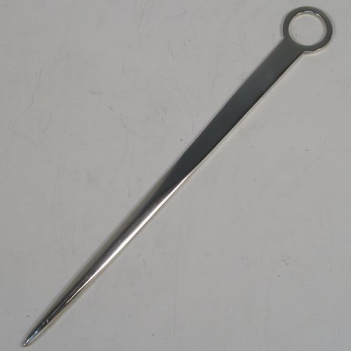 An elegant Sterling Silver meat or game bird skewer, having a very plain tapering body with a ring handle. This beautiful sterling silver skewer was made by J. A. Campbell of London in 1988. The dimensions of this fine hand-made silver game bird or meat skewer are length 21 cms (8.25 inches), and it weighs approx. 55g (1.8 troy ounces).