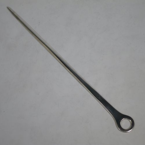 A large and very handsome Antique Georgian George II Sterling Silver meat or game bird skewer, having a very plain tapering body with a plain ring handle. Made by Louis Dupont of London in 1740. The dimensions of this fine hand-made antique silver game bird or meat skewer are length 32.5 cms (12.75 inches), and it weighs approx. 103g (3.3 troy ounces).