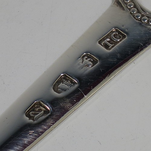 A very handsome Antique Georgian Sterling Silver meat or game bird skewer, having a very plain tapering body with a bead border ring handle. Made by Thomas Chawner of London in 1776. The dimensions of this fine hand-made antique silver game bird or meat skewer are length 27.5 cms (10.75 inches), and it weighs approx. 56g (1.8 troy ounces).
