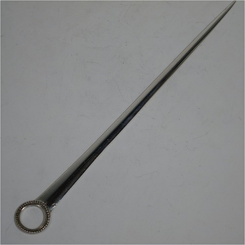 A very handsome Antique Georgian Sterling Silver meat or game bird skewer, having a very plain tapering body with a bead border ring handle. Made by Thomas Chawner of London in 1776. The dimensions of this fine hand-made antique silver game bird or meat skewer are length 27.5 cms (10.75 inches), and it weighs approx. 56g (1.8 troy ounces).