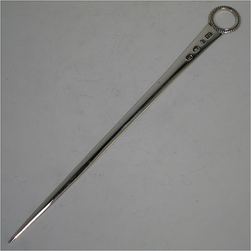 A very handsome Antique Georgian Sterling Silver meat or game bird skewer, having a very plain tapering body with a bead border ring handle. Made by Thomas Chawner of London in 1776. The dimensions of this fine hand-made antique silver game bird or meat skewer are length 27.5 cms (10.75 inches), and it weighs approx. 56g (1.8 troy ounces).