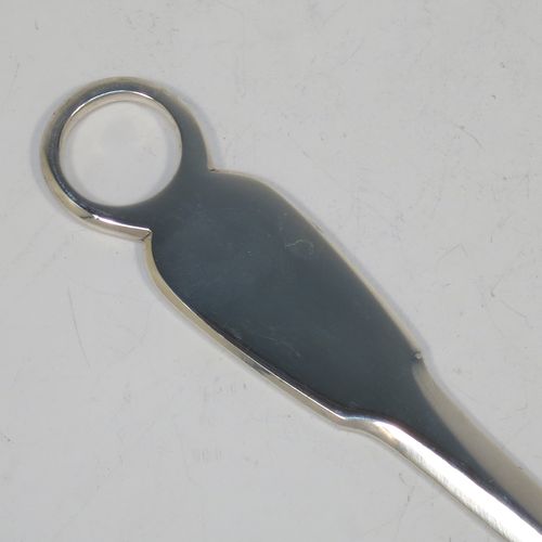 A handsome Antique Georgian Sterling Silver meat or game bird skewer in the Fiddle pattern, having a very plain tapering body with Fiddle shoulders and a ring handle. Made by William Bateman of London in 1830. The dimensions of this fine hand-made antique silver game bird or meat skewer are length 30.5 cms (12 inches), and it weighs approx. 87g (2.8 troy ounces).