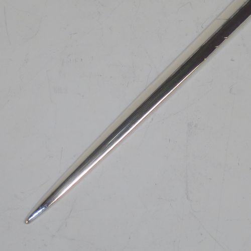 A handsome Antique Georgian Sterling Silver meat or game bird skewer in the Fiddle pattern, having a very plain tapering body with Fiddle shoulders and a ring handle. Made by William Bateman of London in 1830. The dimensions of this fine hand-made antique silver game bird or meat skewer are length 30.5 cms (12 inches), and it weighs approx. 87g (2.8 troy ounces).