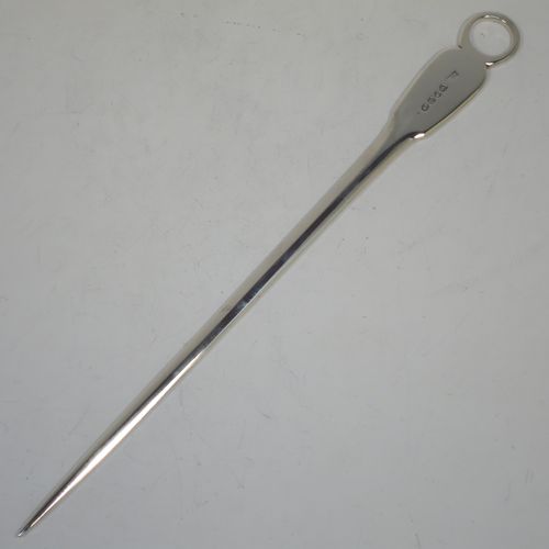 A handsome Antique Georgian Sterling Silver meat or game bird skewer in the Fiddle pattern, having a very plain tapering body with Fiddle shoulders and a ring handle. Made by William Bateman of London in 1830. The dimensions of this fine hand-made antique silver game bird or meat skewer are length 30.5 cms (12 inches), and it weighs approx. 87g (2.8 troy ounces).