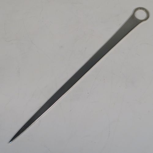 A very handsome Antique Georgian George III Sterling Silver meat or game bird skewer, having a very plain tapering body with a plain ring handle. This elegant antique silver skewer was made by William Bateman of London in 1814. The dimensions of this fine hand-made antique silver game bird or meat skewer are length 25.5 cms (10 inches), and it weighs approx. 64g (2 troy ounces).