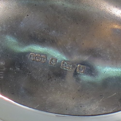 An Antique Victorian Sterling Silver tobacco box, having a plain oval body, and squeeze-action sprung hinged lid. Made by Elkington & Co., of Birmingham in 1901. The dimensions of this fine hand-made antique silver tobacco box are length 9 cms (3.5 inches), width 6.5 cms (2.5 inches), depth 3 cms (1.25 inches), and it weighs approx. 102g (3.3 troy ounces).